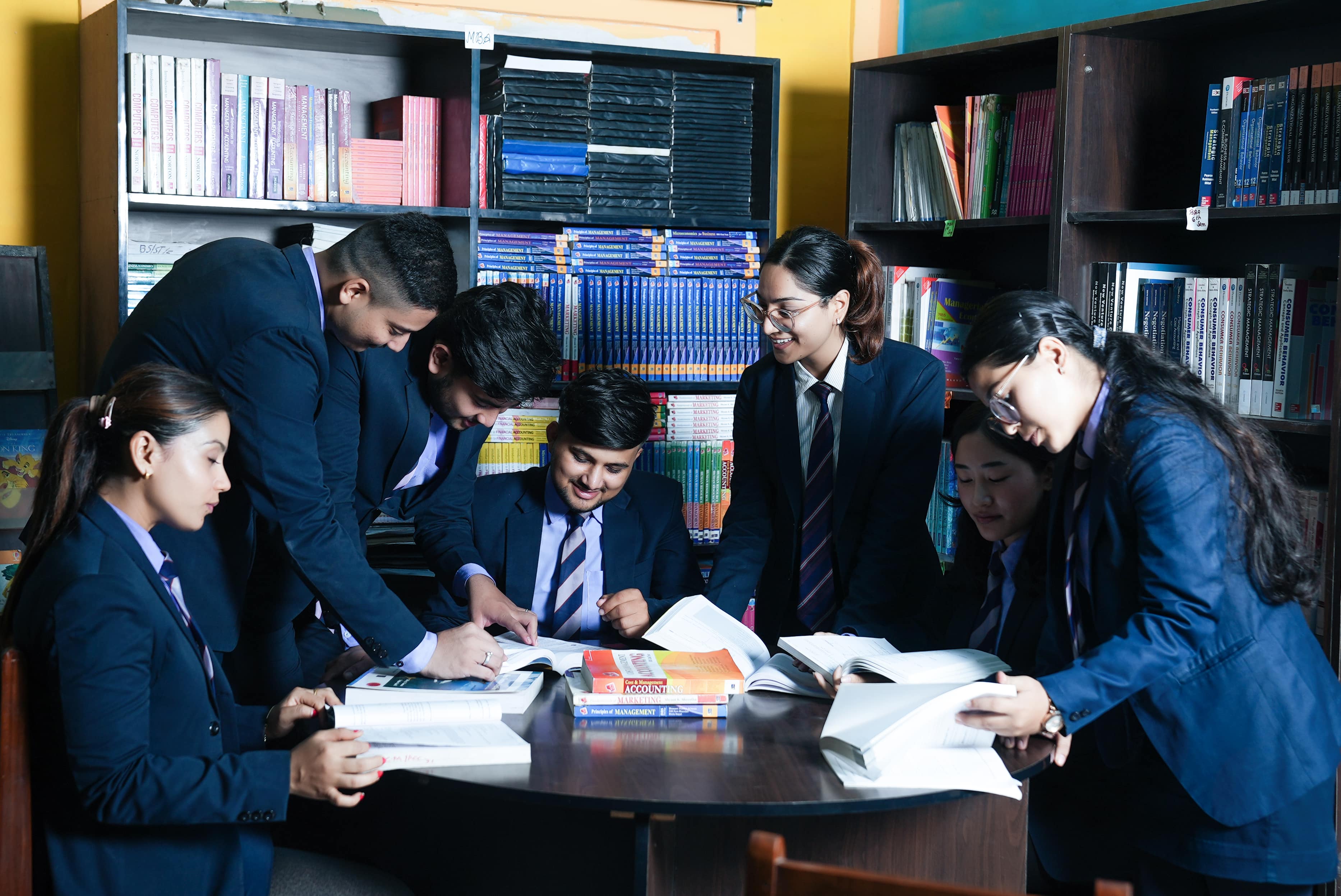 Students sitting in a lecture hall, representing academic learning